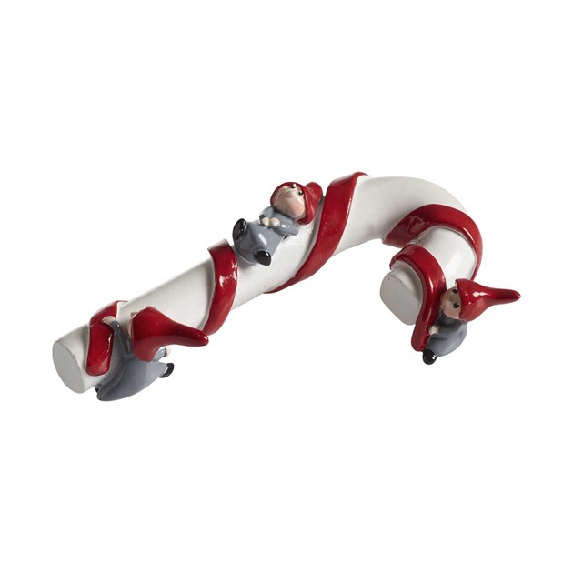Wichtel Nisse auf Zuckerstange sitzend L.10cm